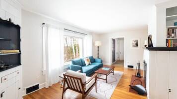 TV, fireplace, books, offices