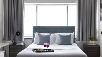 Hypo-allergenic bedding, in-room safe, desk, laptop workspace