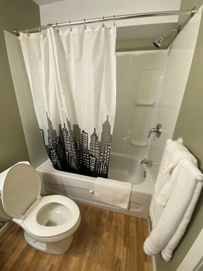 Shower, towels, toilet paper