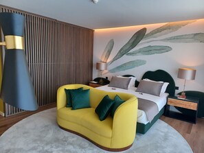 Junior-Studiosuite | Minibar, individuell dekoriert, individuell eingerichtet
