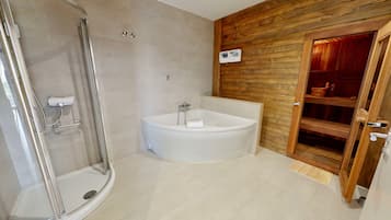 Bathtub, hair dryer, towels