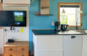 Fridge, stovetop, dishwasher, coffee/tea maker