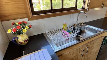 Standard Cabin, 1 Bedroom | Private kitchen | Full-sized fridge, oven, coffee/tea maker, cookware/dishes/utensils
