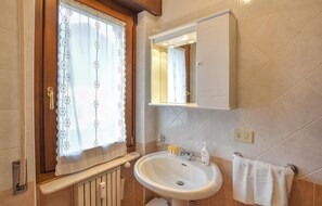 Regadera y secadora de cabello 