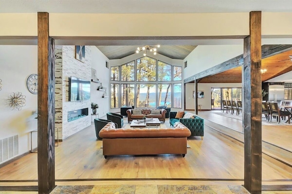 Living room with gorgeous lake view as you enter through the main door