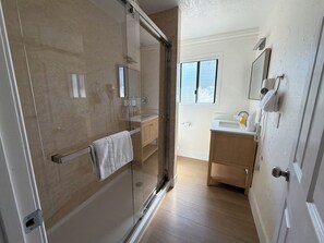 Hair dryer, towels, soap, shampoo