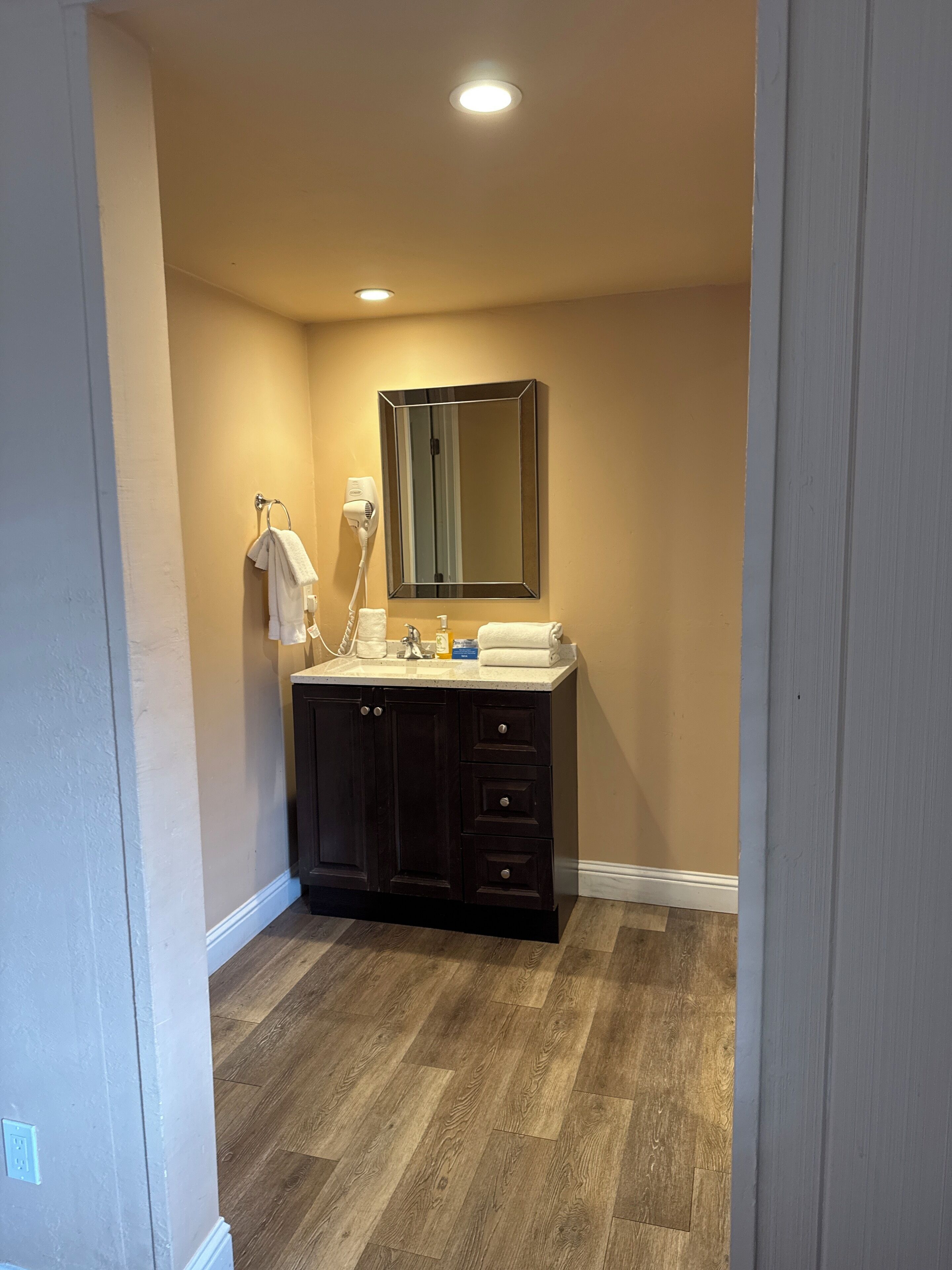 Hair dryer, towels, soap, shampoo