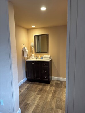 Hair dryer, towels, soap, shampoo