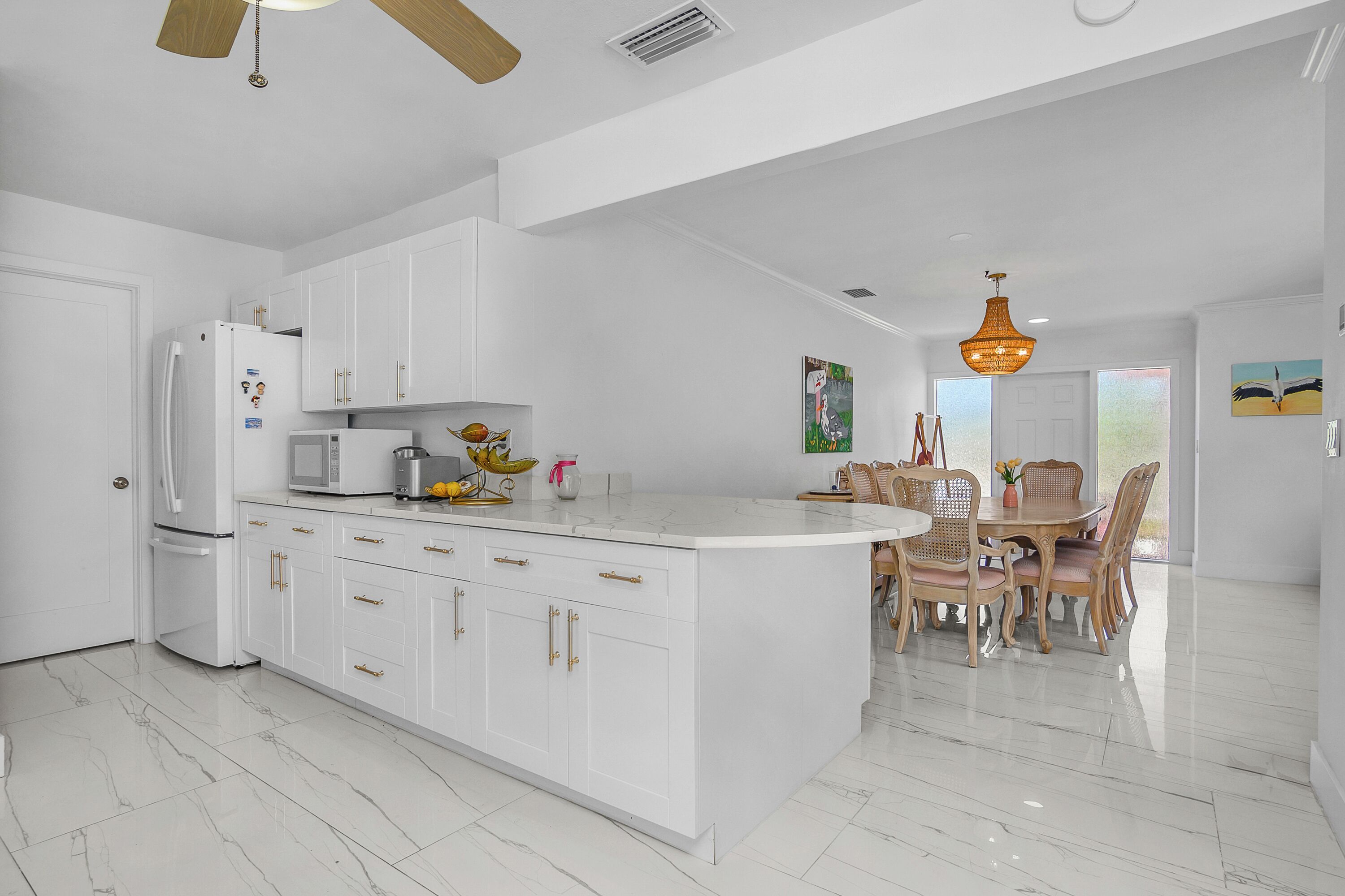 Fridge, stovetop, dishwasher, coffee/tea maker