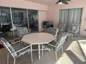 Outdoor dining - Spacious Pool Home/ 1 mile to Barefoot Beach/ Fully Fenced Lot, Pets Stay Free (Bonita Springs)