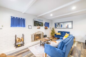 Smart TV, fireplace, books