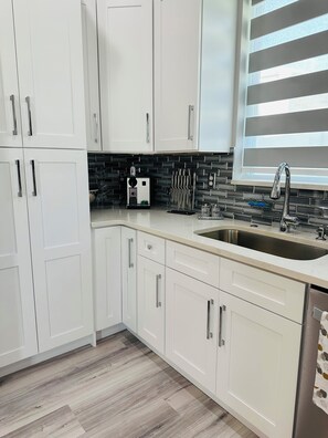 Fridge, microwave, dishwasher, coffee/tea maker