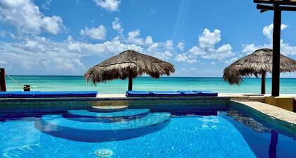 Cottage de 1 recamara para 2/3 a solos 20 metros del mar, Wi-Fi, alberca, Staff