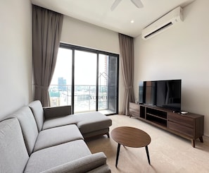 Apartemen Deluks | Area keluarga | Televisi 55-inci dengan saluran TV kabel, Netflix, dan layanan streaming