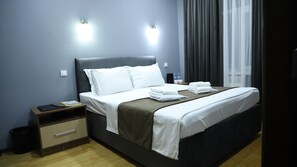 Egyptian cotton sheets, premium bedding, down comforters, minibar