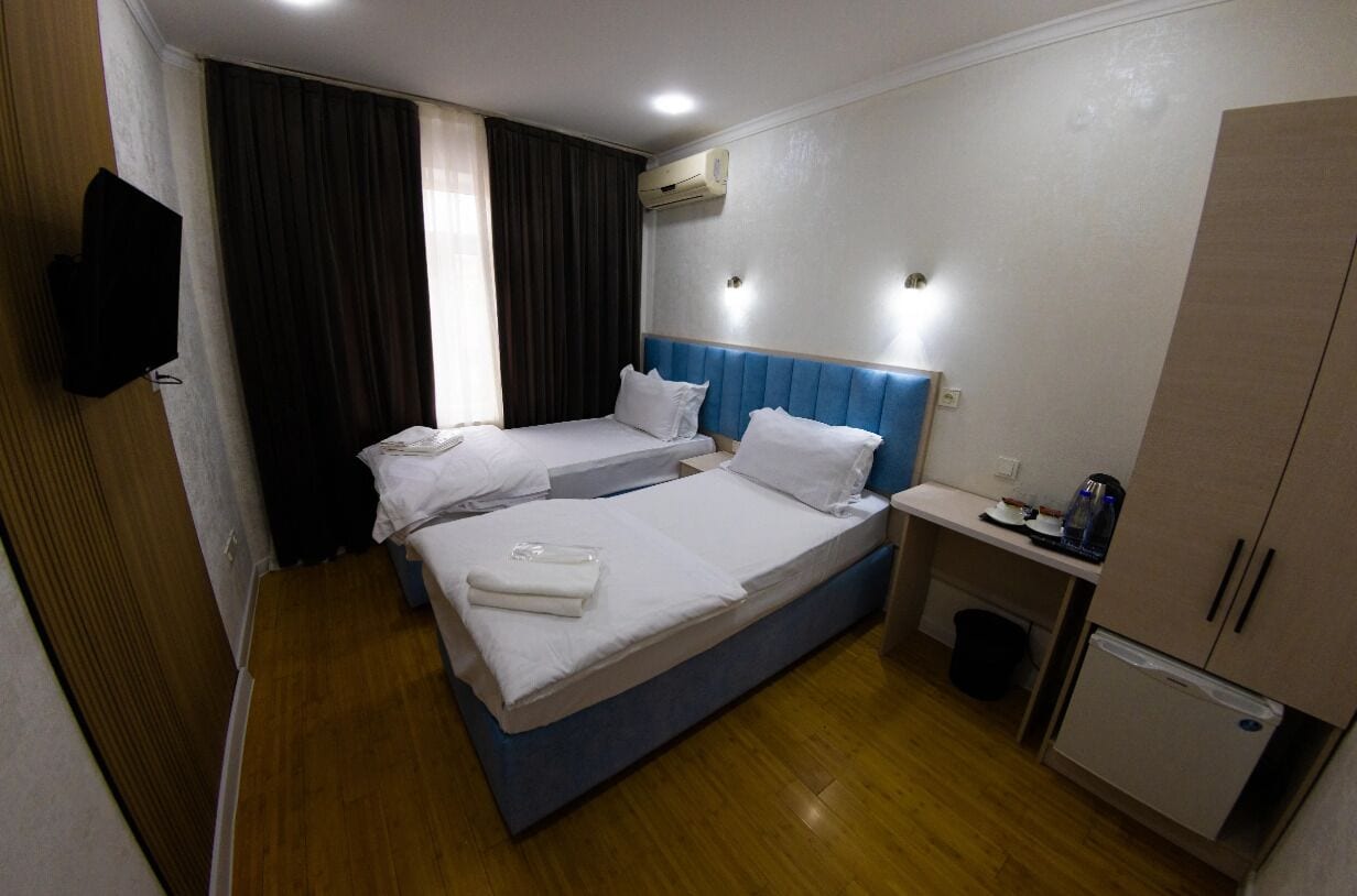 Egyptian cotton sheets, premium bedding, down duvets, minibar