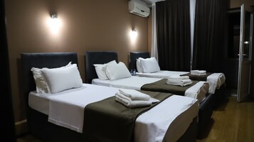 Egyptian cotton sheets, premium bedding, down duvets, minibar