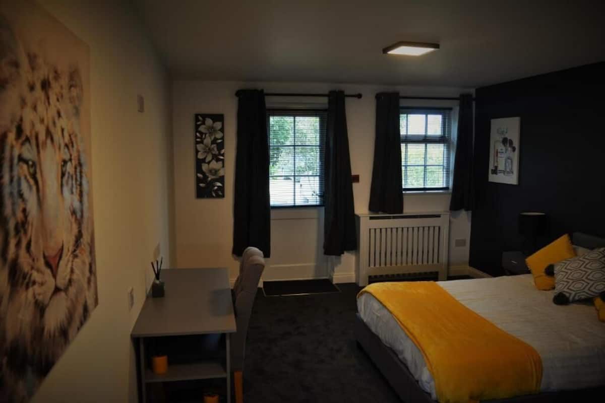 Quarto família, 2 quartos | Ferros/tábuas de passar roupa, Wi-Fi de cortesia, roupa de cama