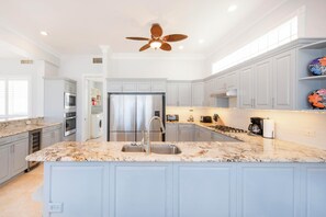 Fridge, microwave, oven, stovetop - Iggy Blue: Rum Point Villa w/Pool, Spa, & Snorkeling Beachfront. (Rum Point)