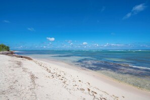 On the beach, sun-loungers, beach towels