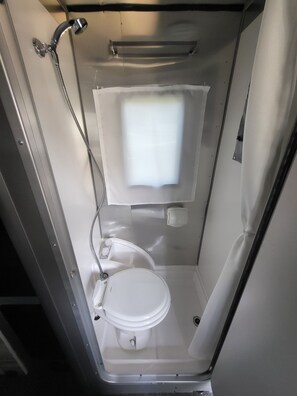 Shower, towels, soap, shampoo