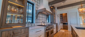 Luxury beach-front home, gourmet kitchen, private pool, gated community, gear