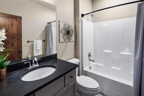 Hair dryer, towels, soap, shampoo