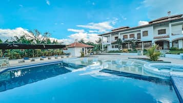 Outdoor pool, open 8:00 AM to 8:00 PM, free cabanas, pool umbrellas