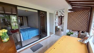 Family Room, Multiple Beds, Non Smoking, Garden View | Blackout curtains, iron/ironing board