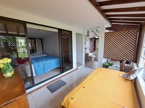 Family Room, Multiple Beds, Non Smoking, Garden View | Blackout curtains, iron/ironing board - Portal La Mariana (Pereira)