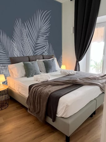 Apartamento família | 2 quartos, cortinas blackout, berço de viagem, Wi-Fi de cortesia. Happy Family Apartments Rovere