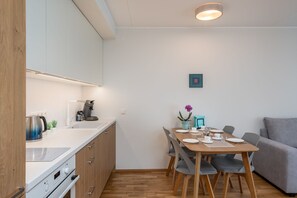 Comfort Apartment | Private kitchen | Coffee/tea maker, electric kettle, highchair, dining tables - HARAKA APARTMENT WITH SUNSET BALCONY  (Tartu)