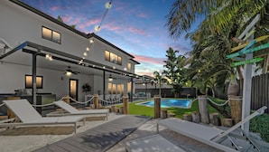 Outdoor pool, a heated pool - Tropical Miami 5BR Retreat • Game Room • Pool_BBQ (Miami)