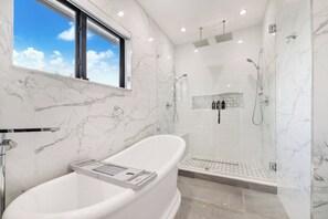 Shower, hair dryer, towels, soap
