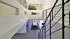 A modern interior with a staircase, a dining area, and a view of the upper floor. - Amazing home in La Chapelle-Vendômoise (La Chapelle-Vendômoise)