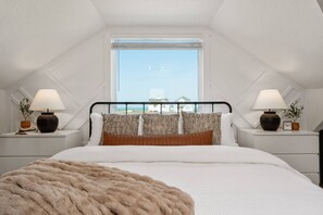 1 habitación, tabla de planchar con plancha y cuna de viaje 