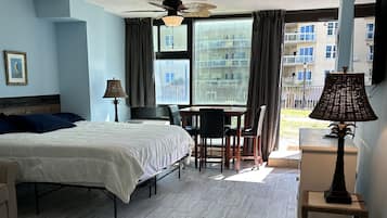 2 habitaciones, tabla de planchar con plancha y cuna de viaje