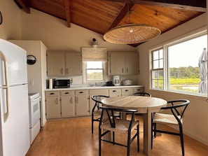 Spacious eat in kitchen with expanding table. 