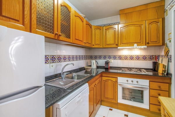 Fridge, stovetop, dishwasher, coffee/tea maker