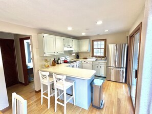 Fridge, microwave, oven, stovetop - Sunny 3 bedroom cape with large deck, porch and kayaks. Pet friendly. (Oak Bluffs)
