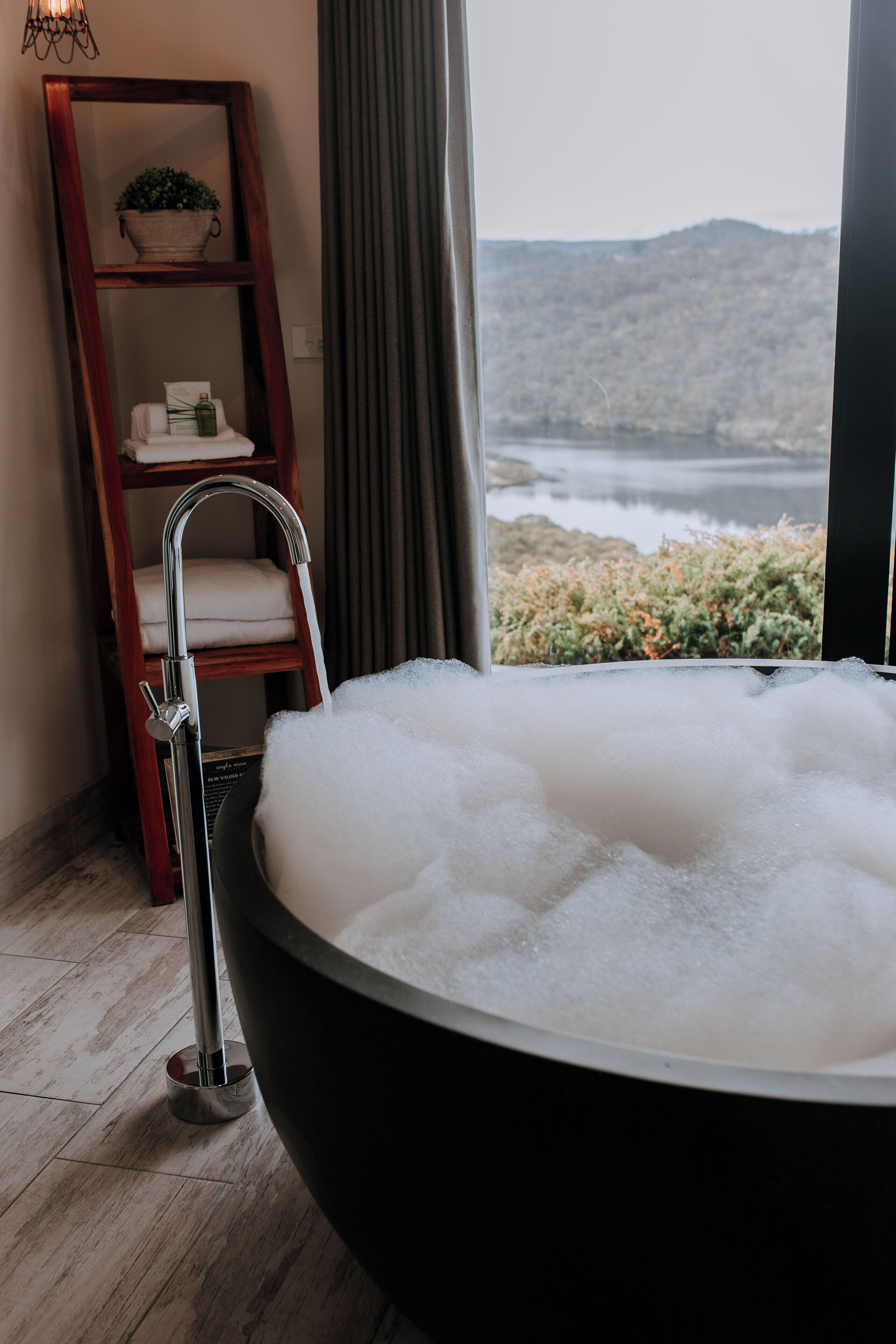 Deluxe Studio Suite | Bathroom | Separate bathtub and shower, jetted bath, rainfall showerhead