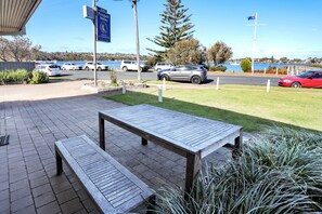 Outdoor dining - On the lake at Penguin Mews: Ground floor pet friendly (Merimbula)