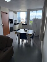 Luxury Studio Suite, Non Smoking, Sea Facing | Living area | 32-inch Smart TV with digital channels, TV