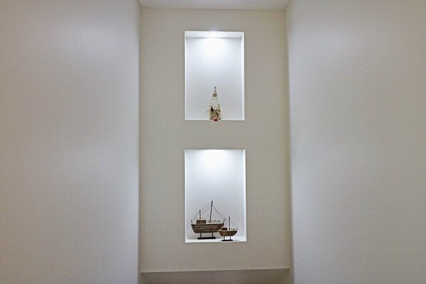 Two framed artworks on a plain wall. - Sybella - 6 Bedroom Option incredible views and a pool (Merimbula)