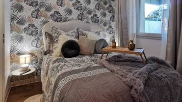 1 chambre, fer et planche Ă repasser, Wi-Fi gratuit, draps fournis