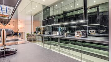 Fridge, microwave, stovetop, coffee/tea maker