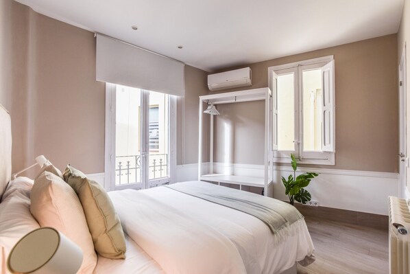 2 dormitorios, tabla de planchar con plancha, wifi gratis y ropa de cama