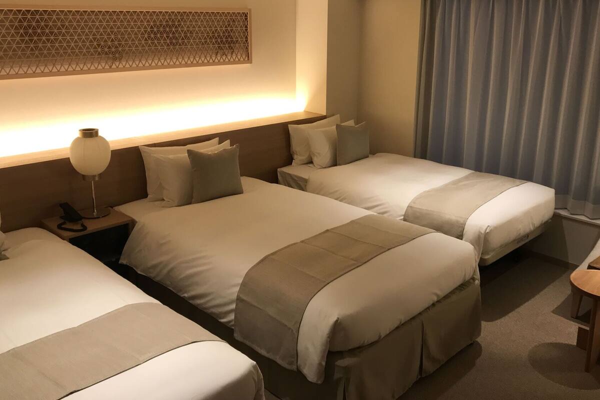 Desk, laptop workspace, free WiFi, bed sheets