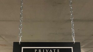 A private parking sign labeled P-307B in a parking garage. - Spring Creek Luxury One Bedroom Sleeps 4 (Canmore)