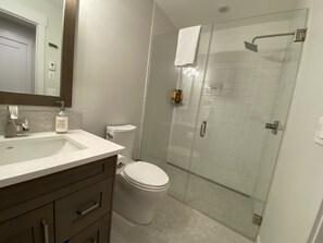 Shower, hair dryer, towels, soap